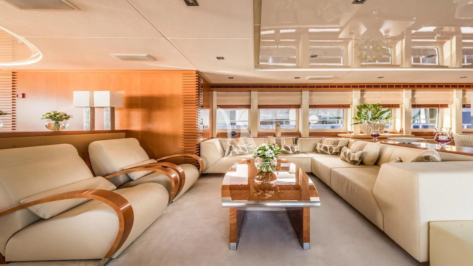 a living room with a couch and a coffee table aboard AGRAM Yacht for Charter