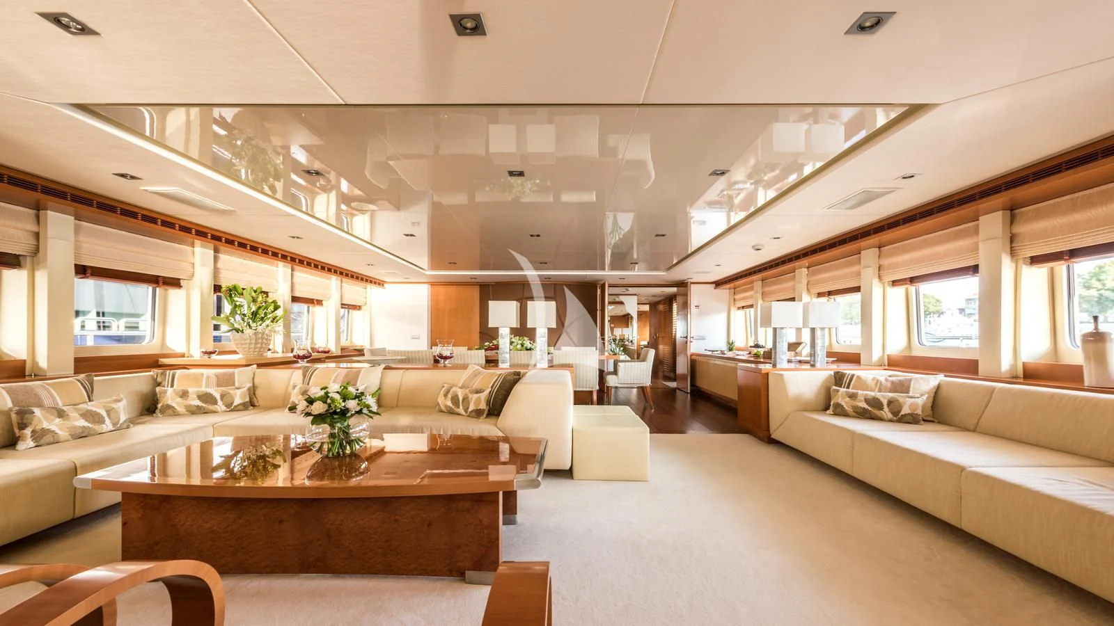 a living room with a couch and a table aboard AGRAM Yacht for Charter