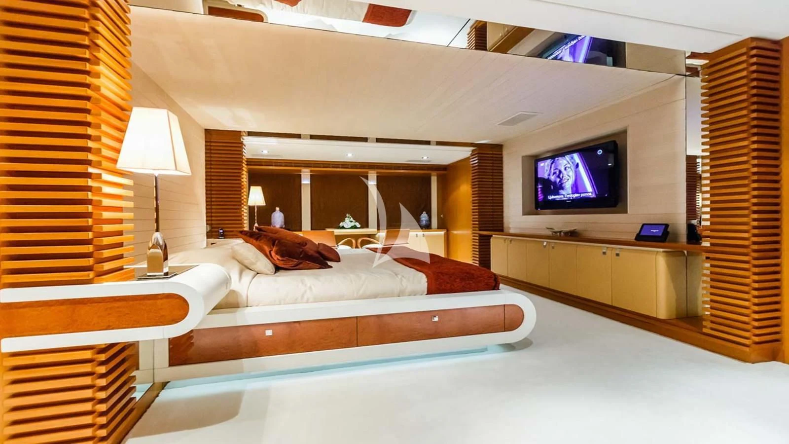 a hotel room with a tv on the wall aboard AGRAM Yacht for Charter