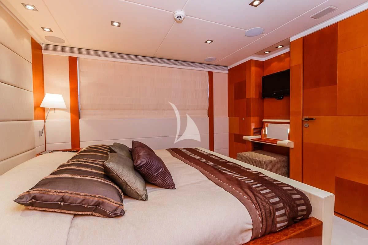 a large bed in a hotel room aboard AGRAM Yacht for Charter