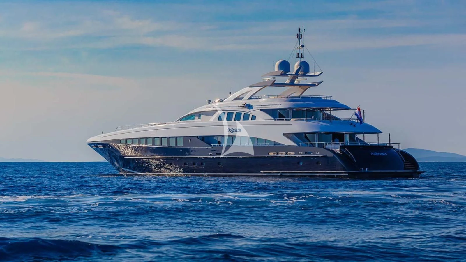 a large white boat in the water aboard AGRAM Yacht for Charter