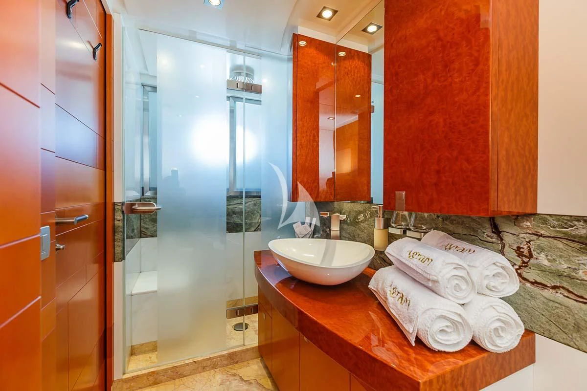 a bathroom with a sink and a mirror aboard AGRAM Yacht for Charter