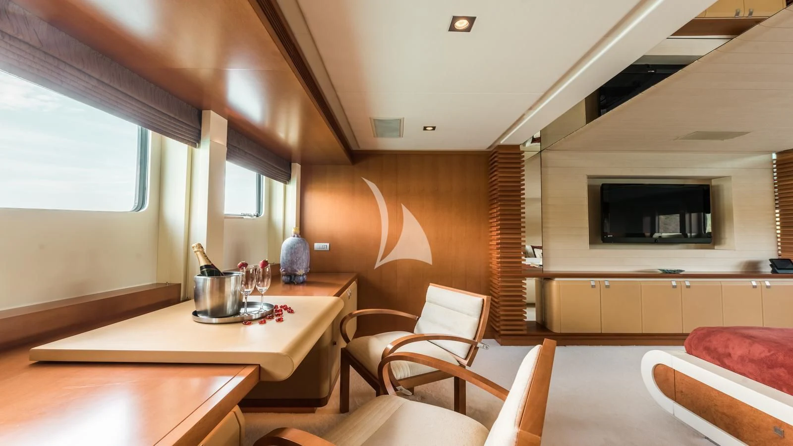 a kitchen with a table and chairs aboard AGRAM Yacht for Charter
