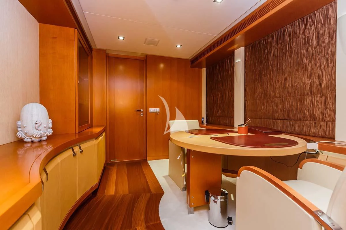 a room with a table and chairs aboard AGRAM Yacht for Charter