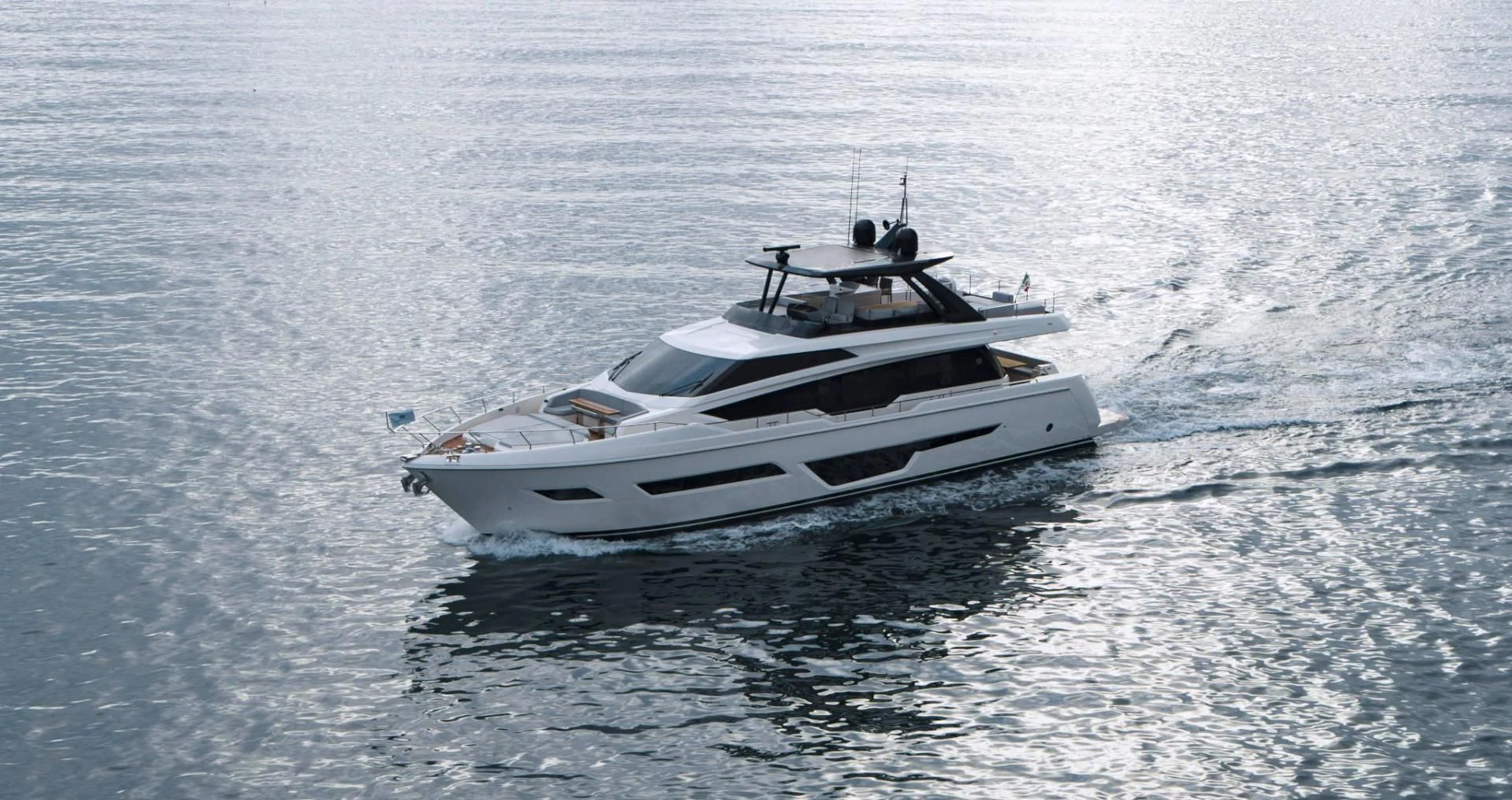 a white yacht in the water aboard ALVEARE Yacht for Sale