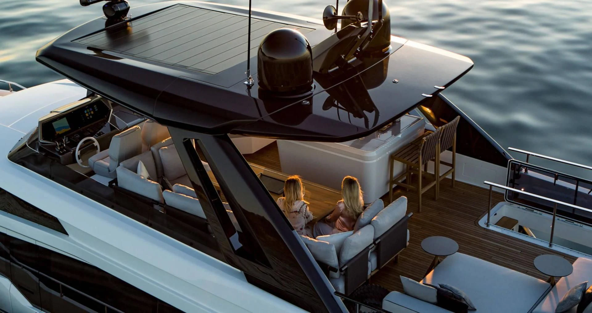 a boat with a couple of people on it aboard ALVEARE Yacht for Sale