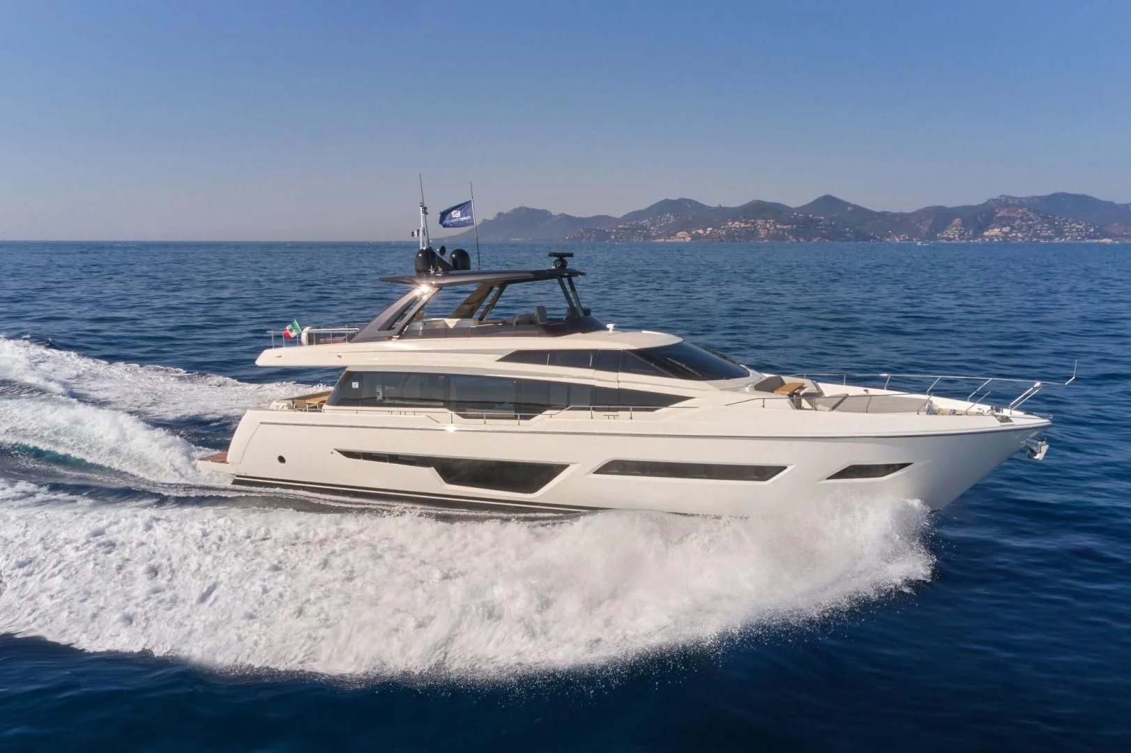 a white yacht on the water aboard ALVEARE Yacht for Sale