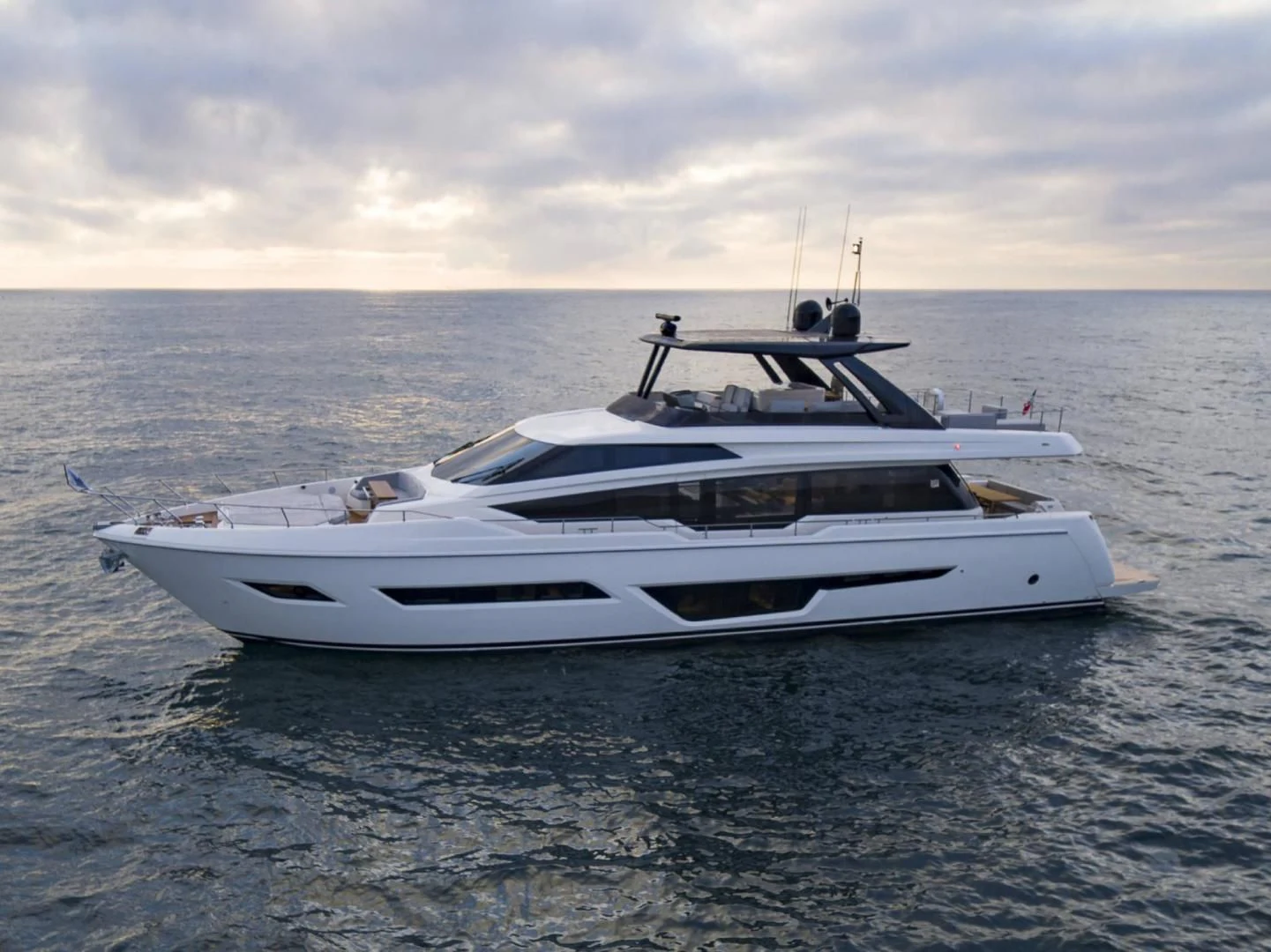 a white yacht in the water aboard ALVEARE Yacht for Sale