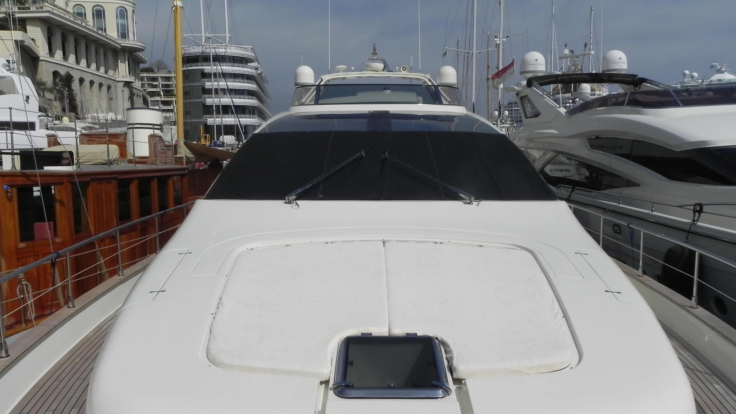 a white yacht in the water aboard WEDGE THREE Yacht for Sale