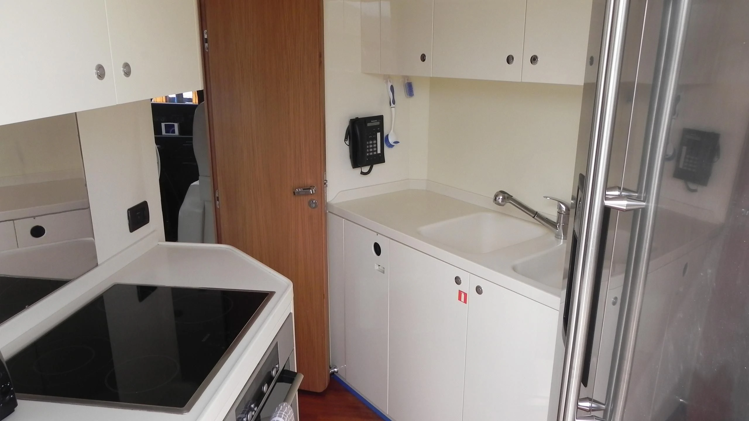 a microwave oven in a kitchen aboard WEDGE THREE Yacht for Sale