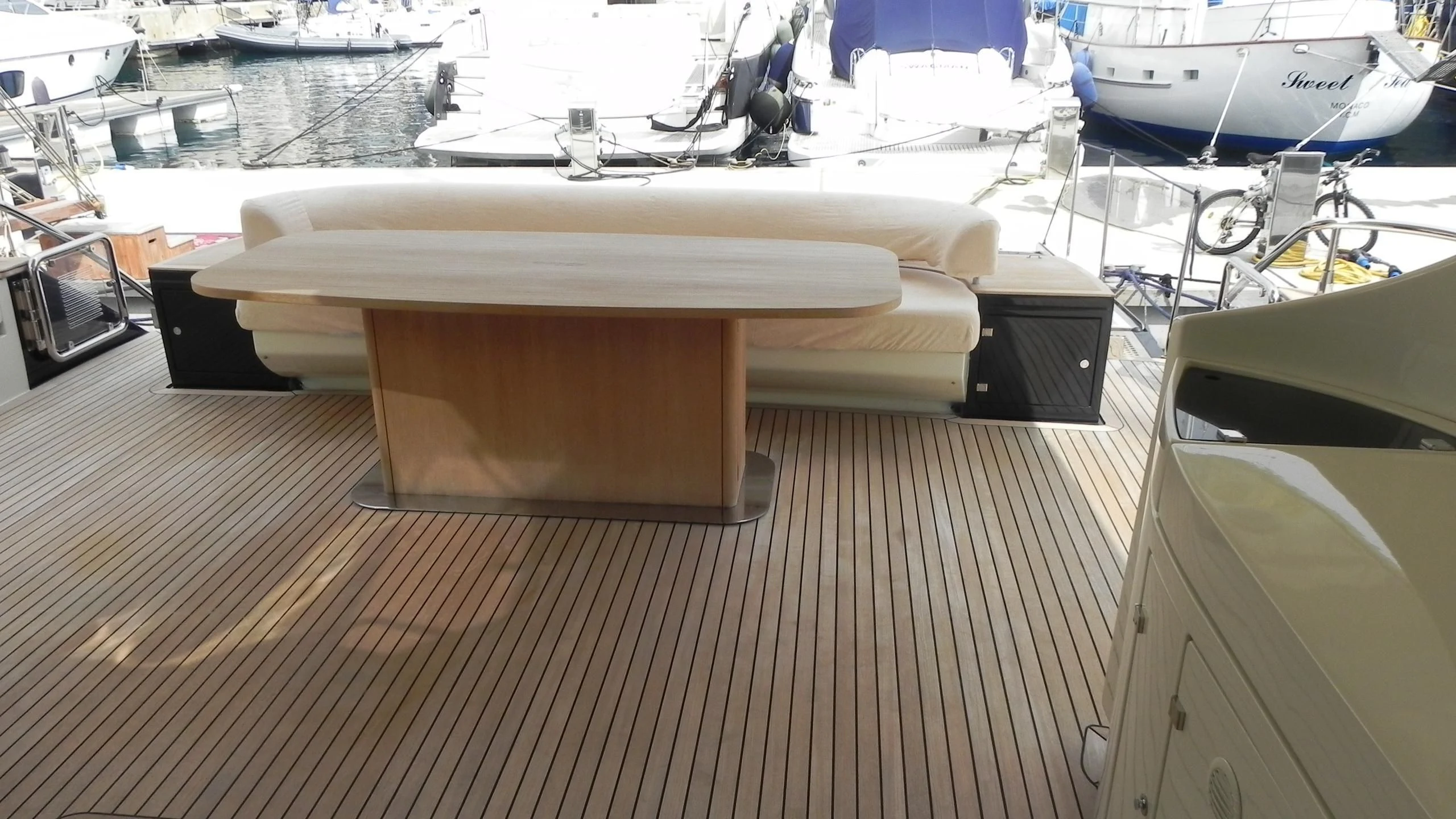 a wooden table on a boat aboard WEDGE THREE Yacht for Sale
