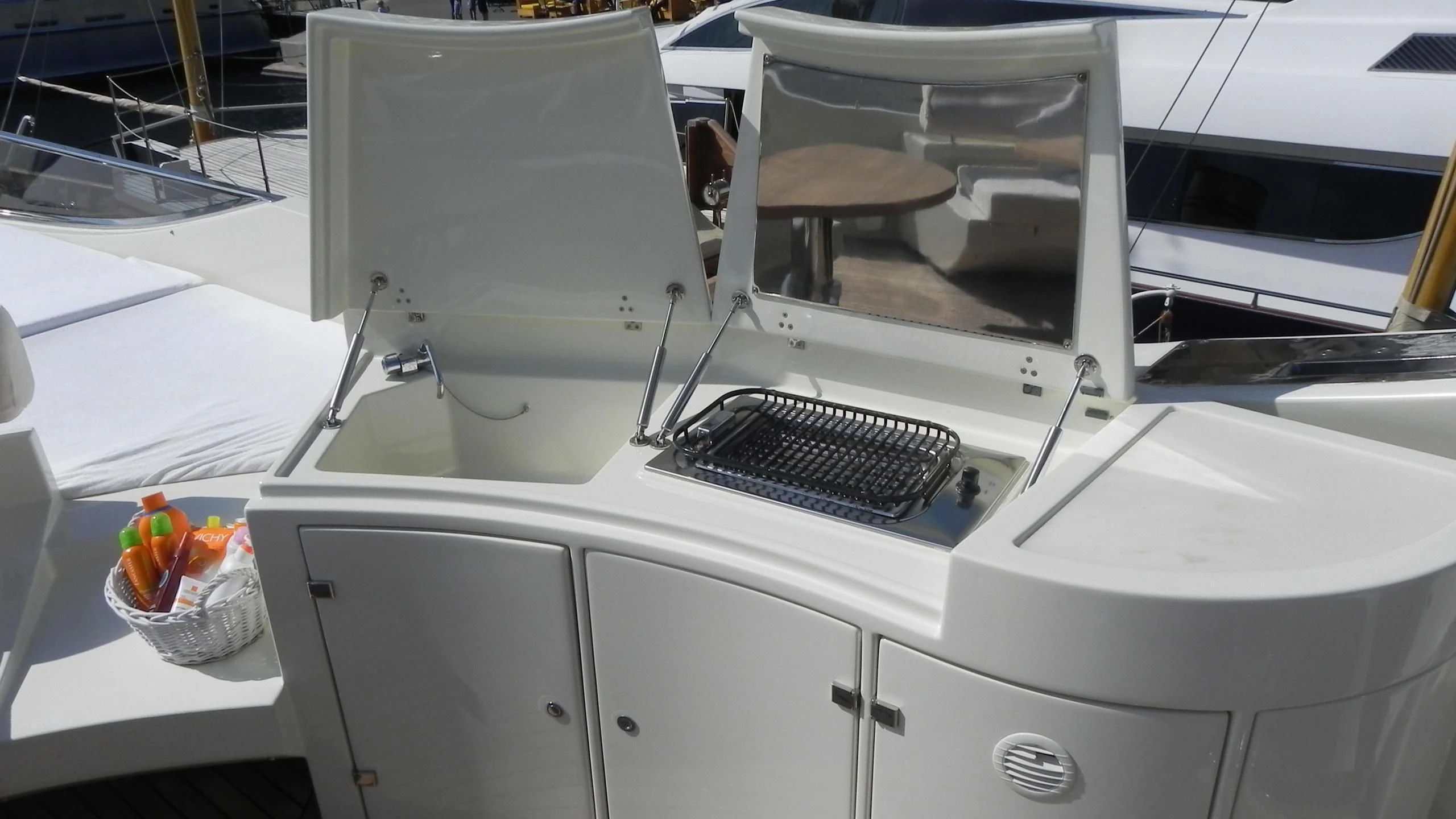 a white car with a black and white object on the front aboard WEDGE THREE Yacht for Sale