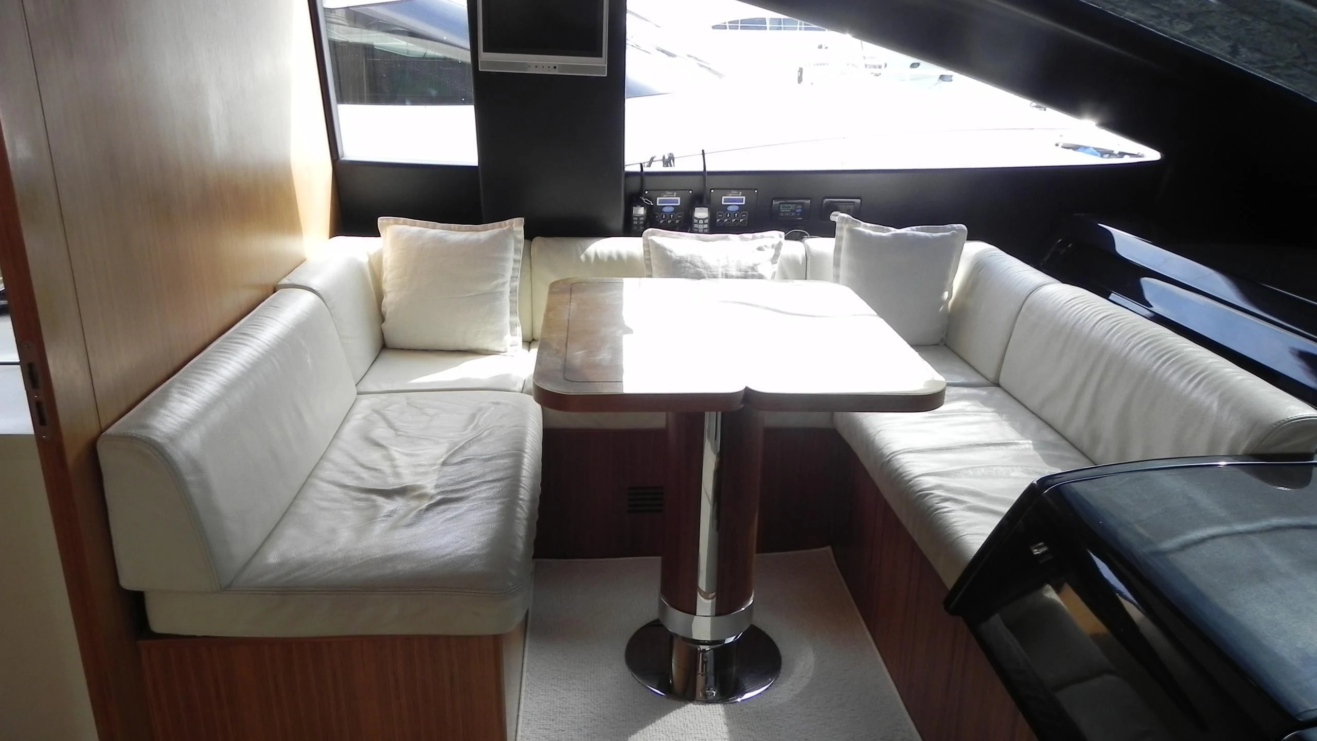 a room with a couch and a table aboard WEDGE THREE Yacht for Sale