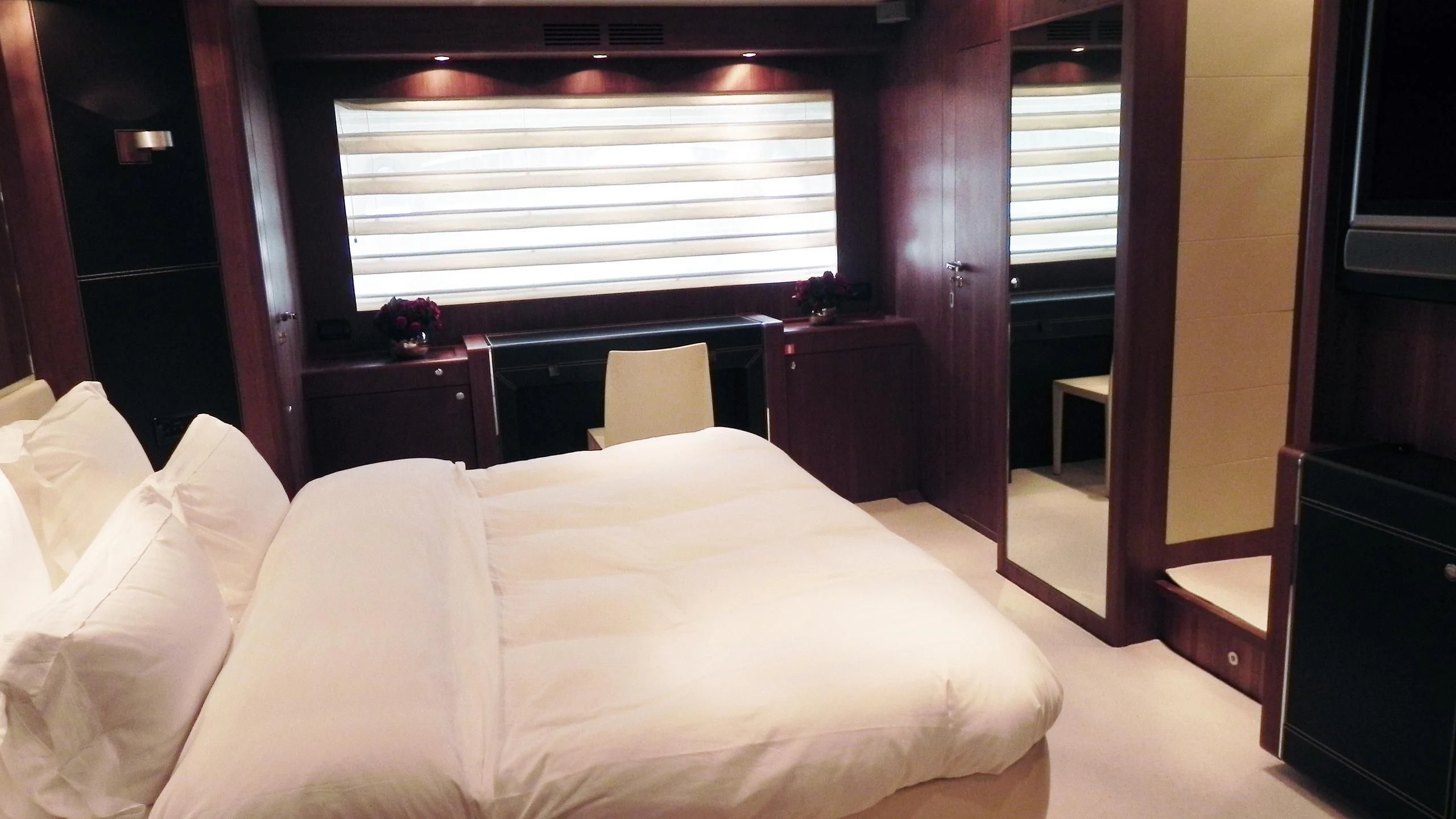 a bed in a room aboard WEDGE THREE Yacht for Sale