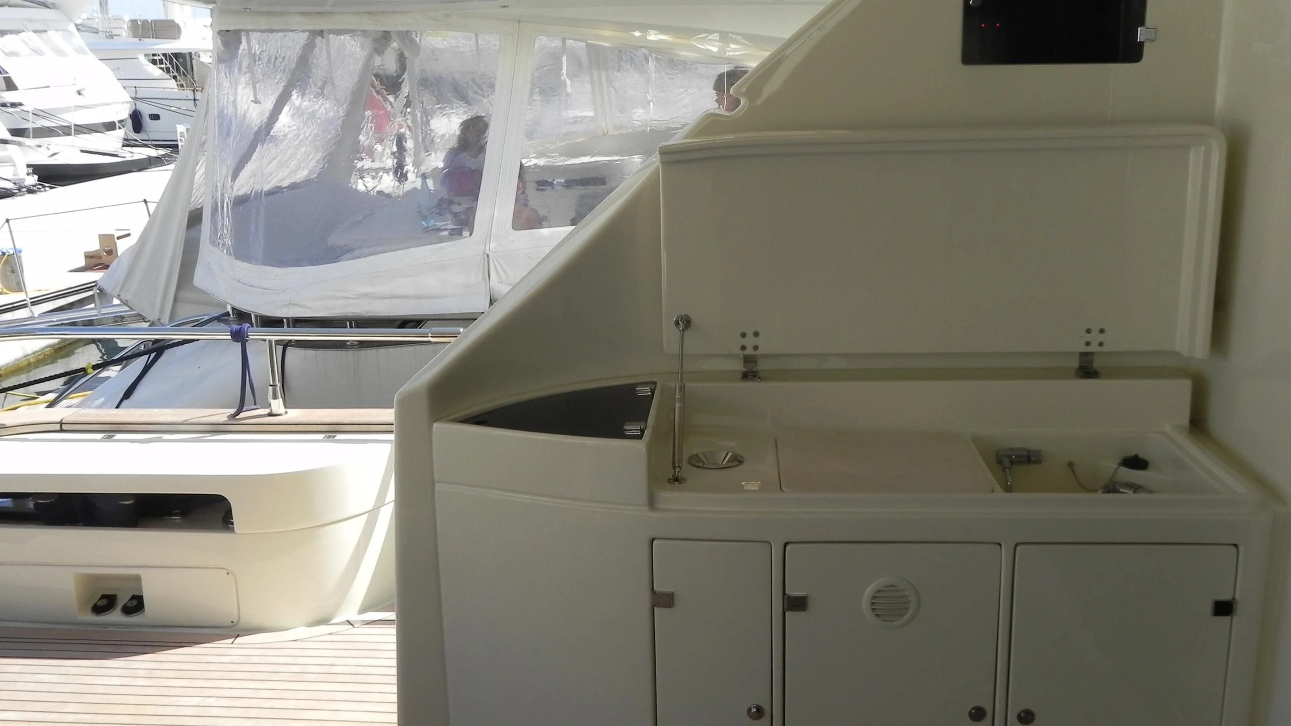 a white machine with a wire aboard WEDGE THREE Yacht for Sale