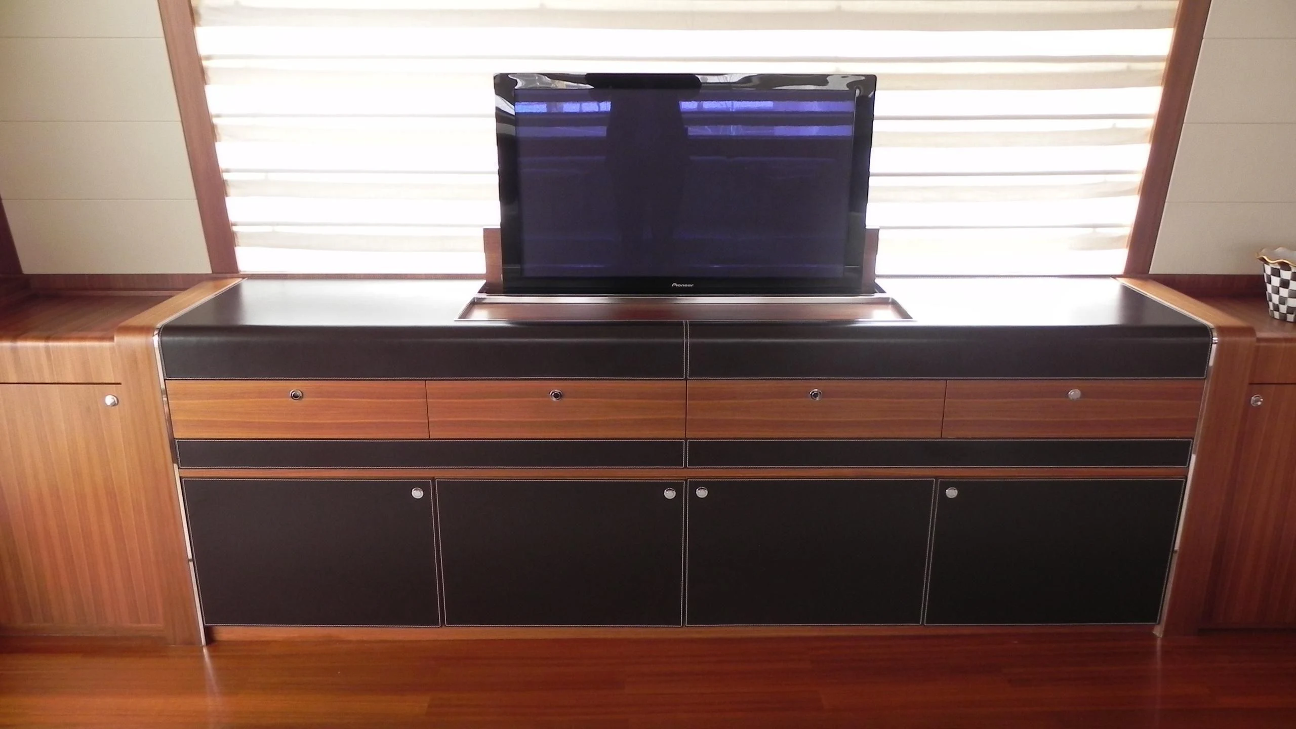 a tv on a shelf aboard WEDGE THREE Yacht for Sale