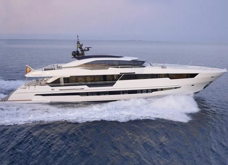 a white yacht in the ocean aboard AMAN Yacht for Sale