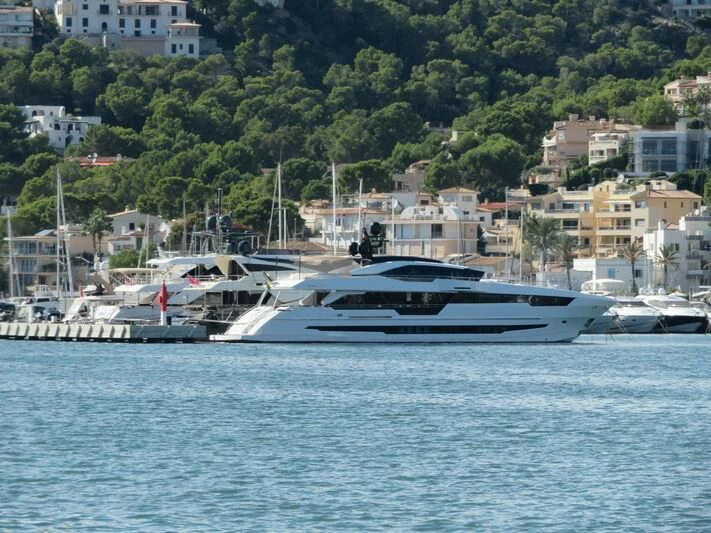 a large boat in the water aboard AMAN Yacht for Sale