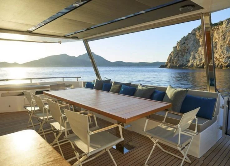 a table on a boat aboard AMAN Yacht for Sale