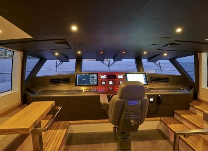 a robot in a room aboard AMAN Yacht for Sale