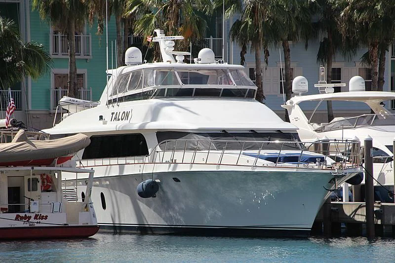 a couple of boats are parked in a harbor aboard WINDWARD Yacht for Charter
