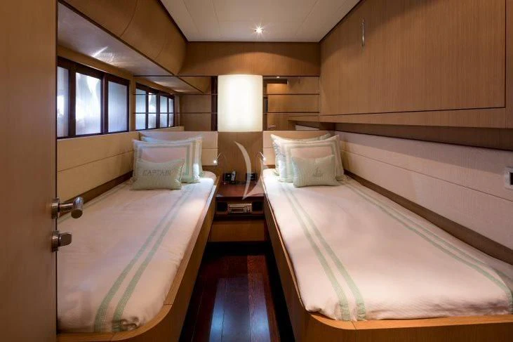 a room with two beds aboard WINDWARD Yacht for Charter