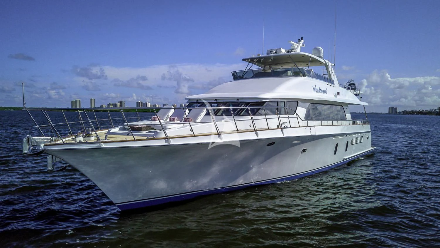 a white yacht in the water aboard WINDWARD Yacht for Charter