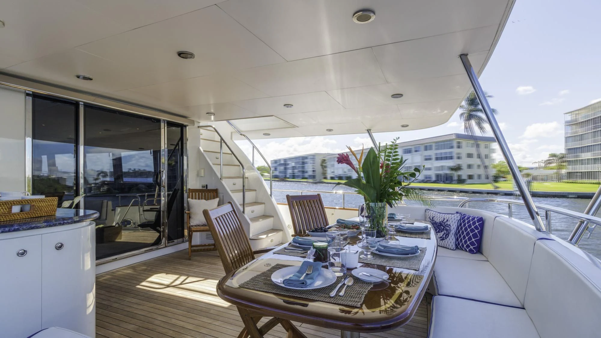 a dining table on a deck aboard WINDWARD Yacht for Charter