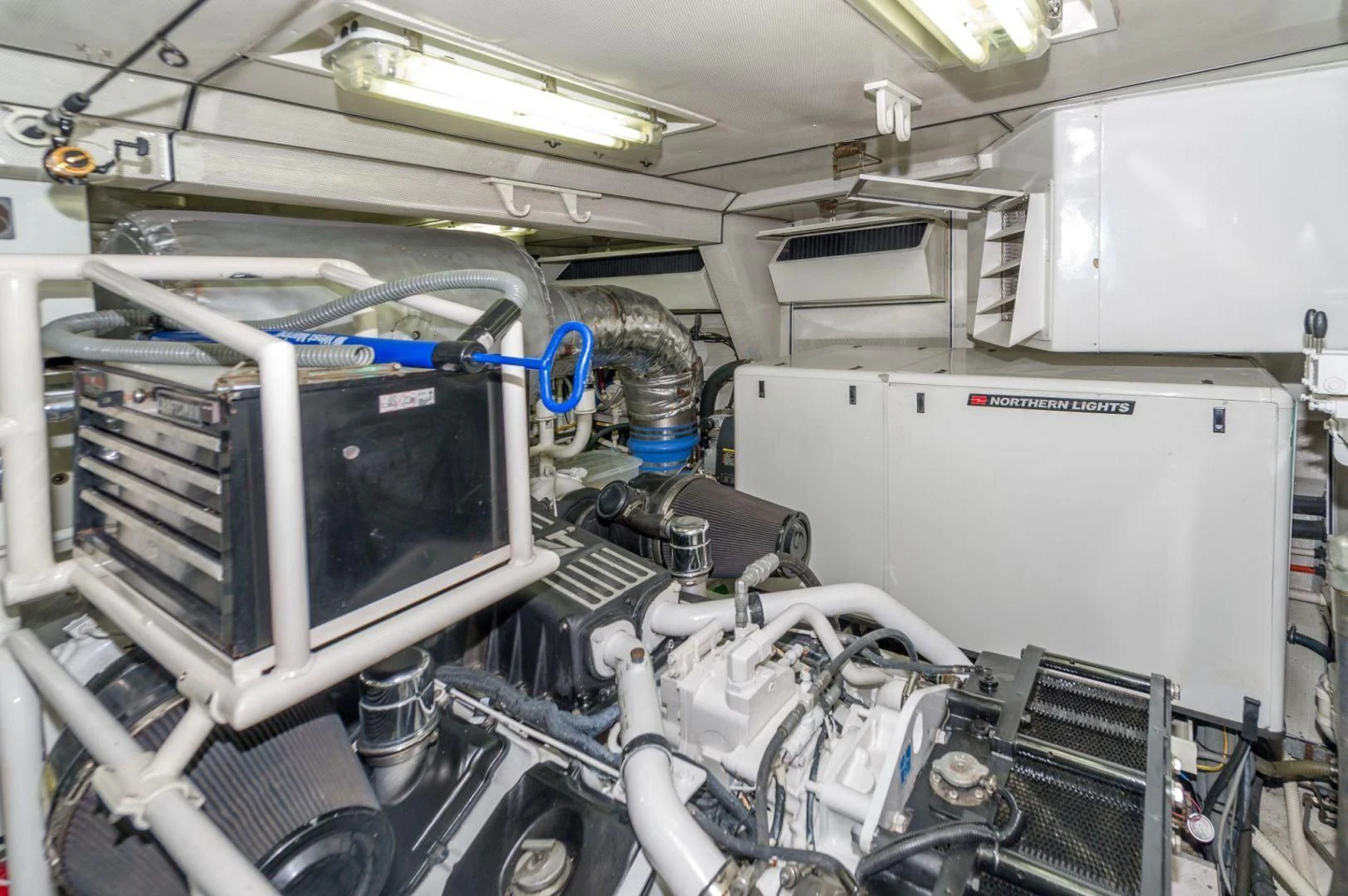 a machine with a blue tube aboard WINDWARD Yacht for Charter