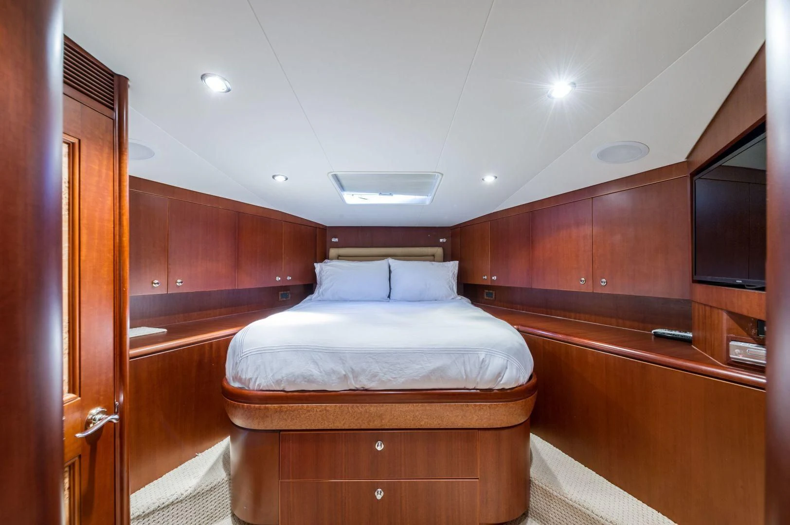 a bed in a room aboard WINDWARD Yacht for Charter