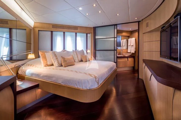 a bed in a room aboard WINDWARD Yacht for Charter