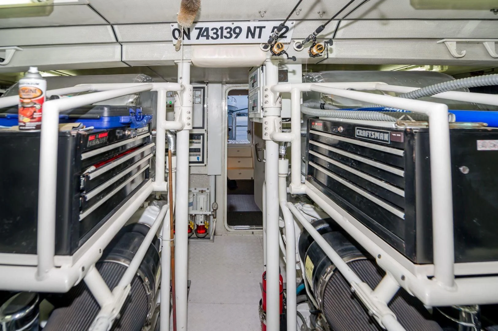 a large white machine aboard WINDWARD Yacht for Charter
