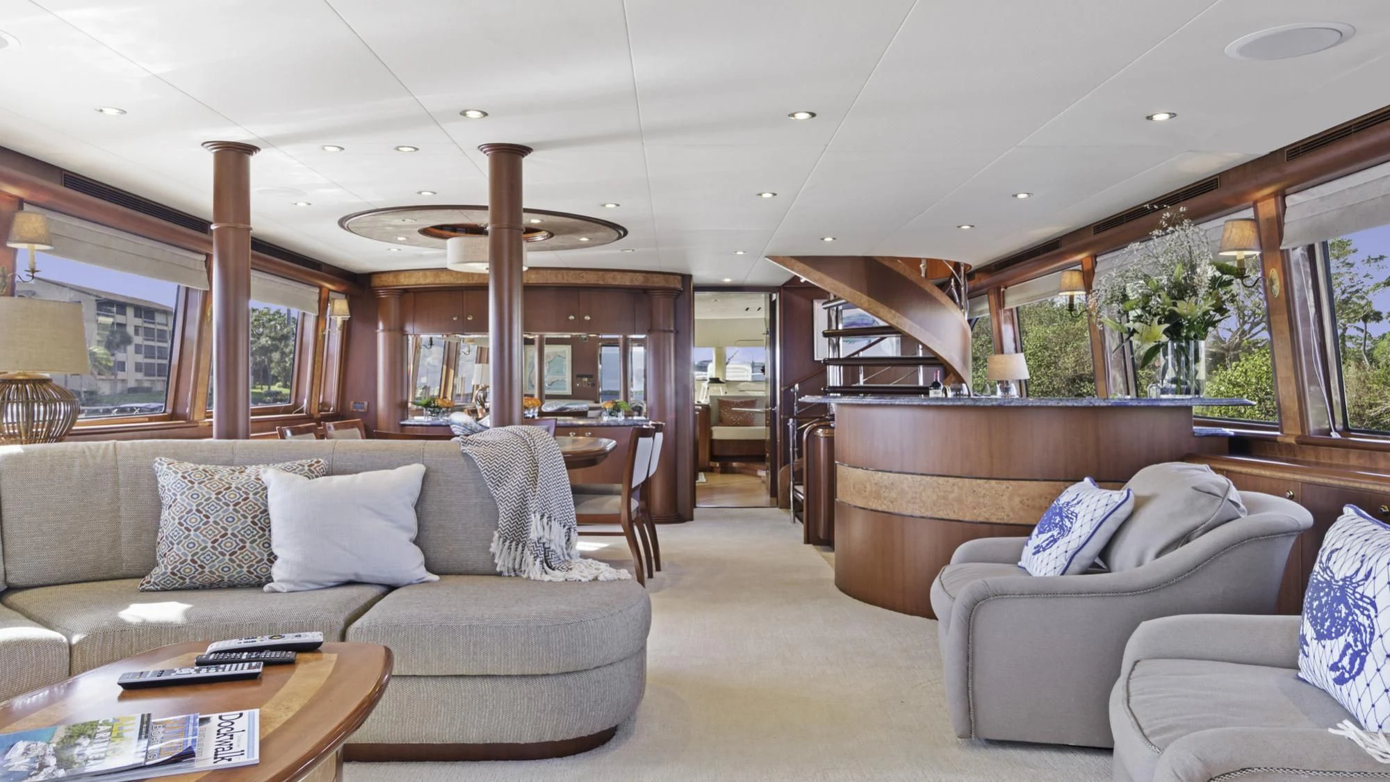 a living room with a couch and a coffee table aboard WINDWARD Yacht for Charter