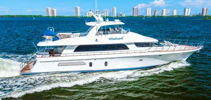 a white yacht on the water aboard WINDWARD Yacht for Charter