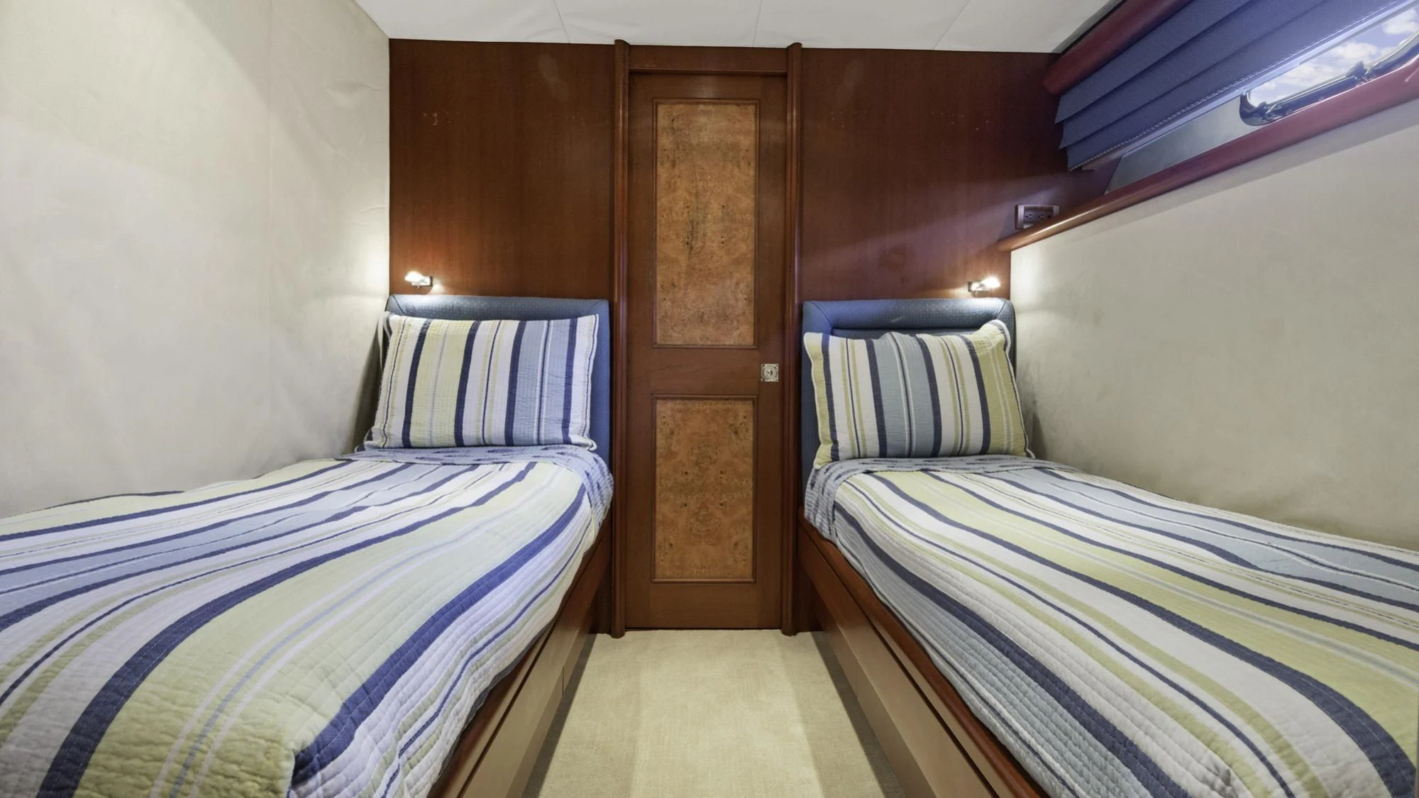 a couple of beds in a room aboard WINDWARD Yacht for Charter