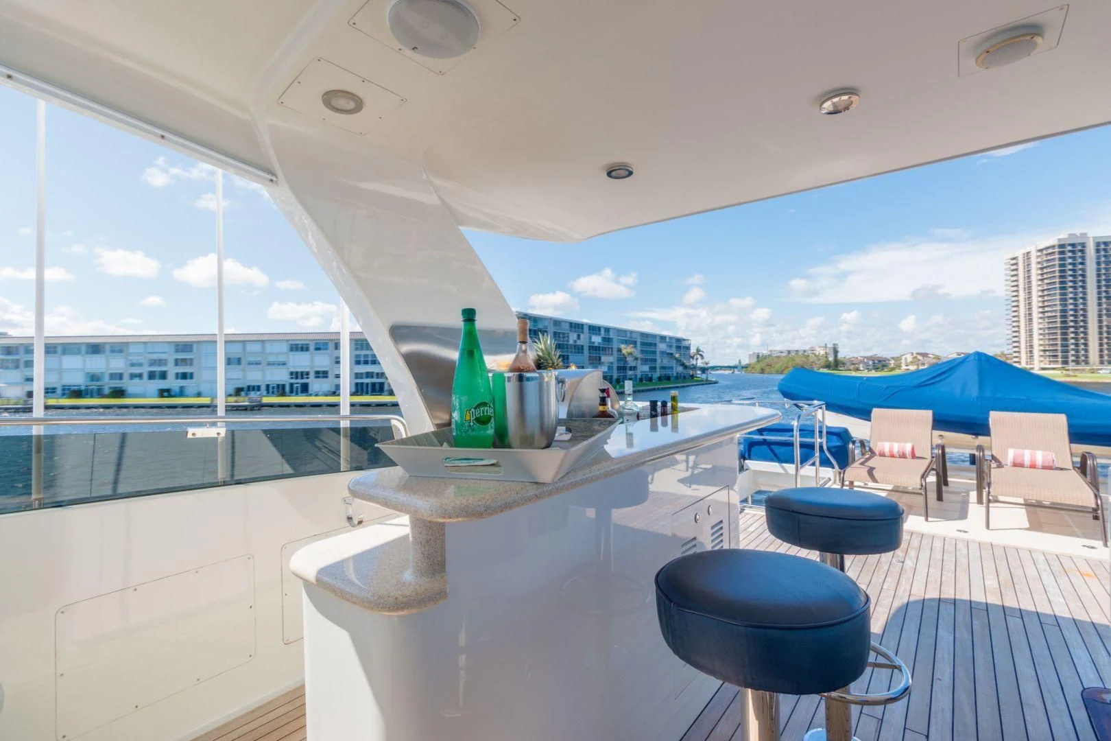 a room with a table and chairs aboard WINDWARD Yacht for Charter