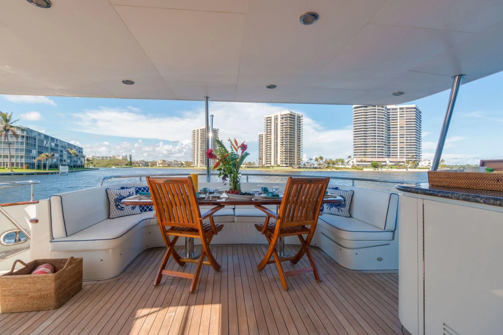 a room with a table and chairs aboard WINDWARD Yacht for Charter