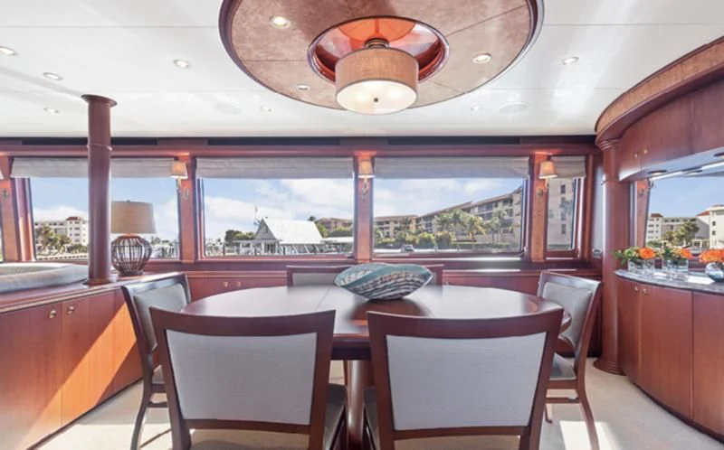a restaurant with a large window aboard WINDWARD Yacht for Charter