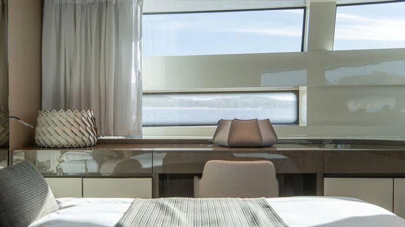 a room with a window and a bed aboard STONE HILLS Yacht for Sale