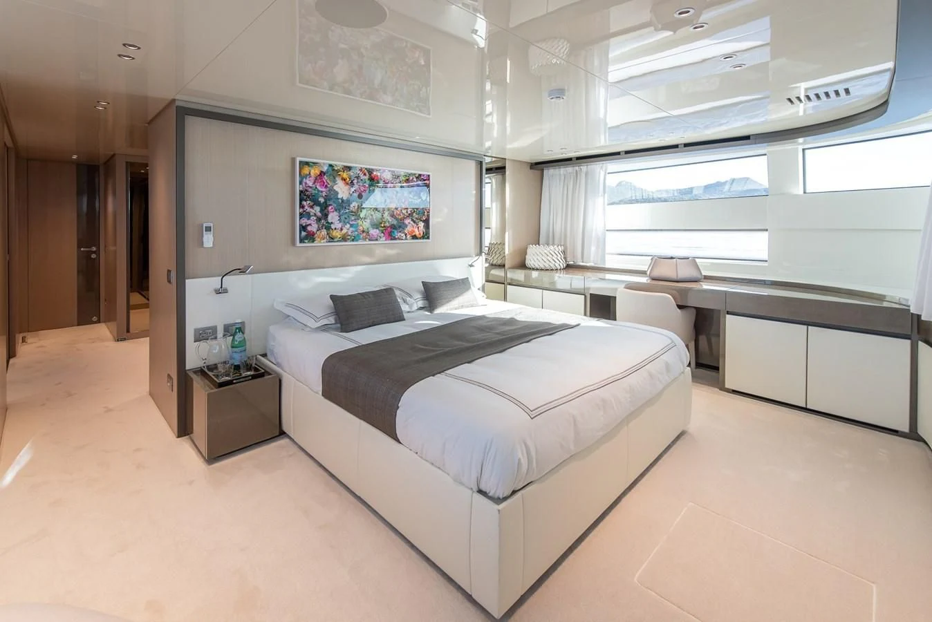 a room with a bed and a desk aboard STONE HILLS Yacht for Sale