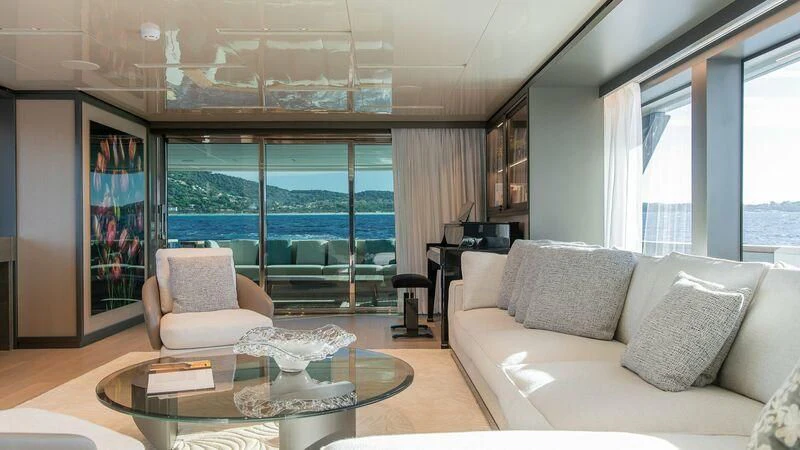 a living room with a large window aboard STONE HILLS Yacht for Sale
