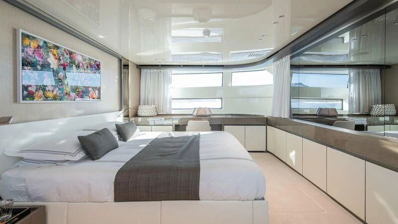 a bedroom with a large bed aboard STONE HILLS Yacht for Sale