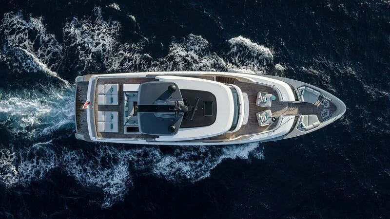 a white car in the water aboard STONE HILLS Yacht for Sale