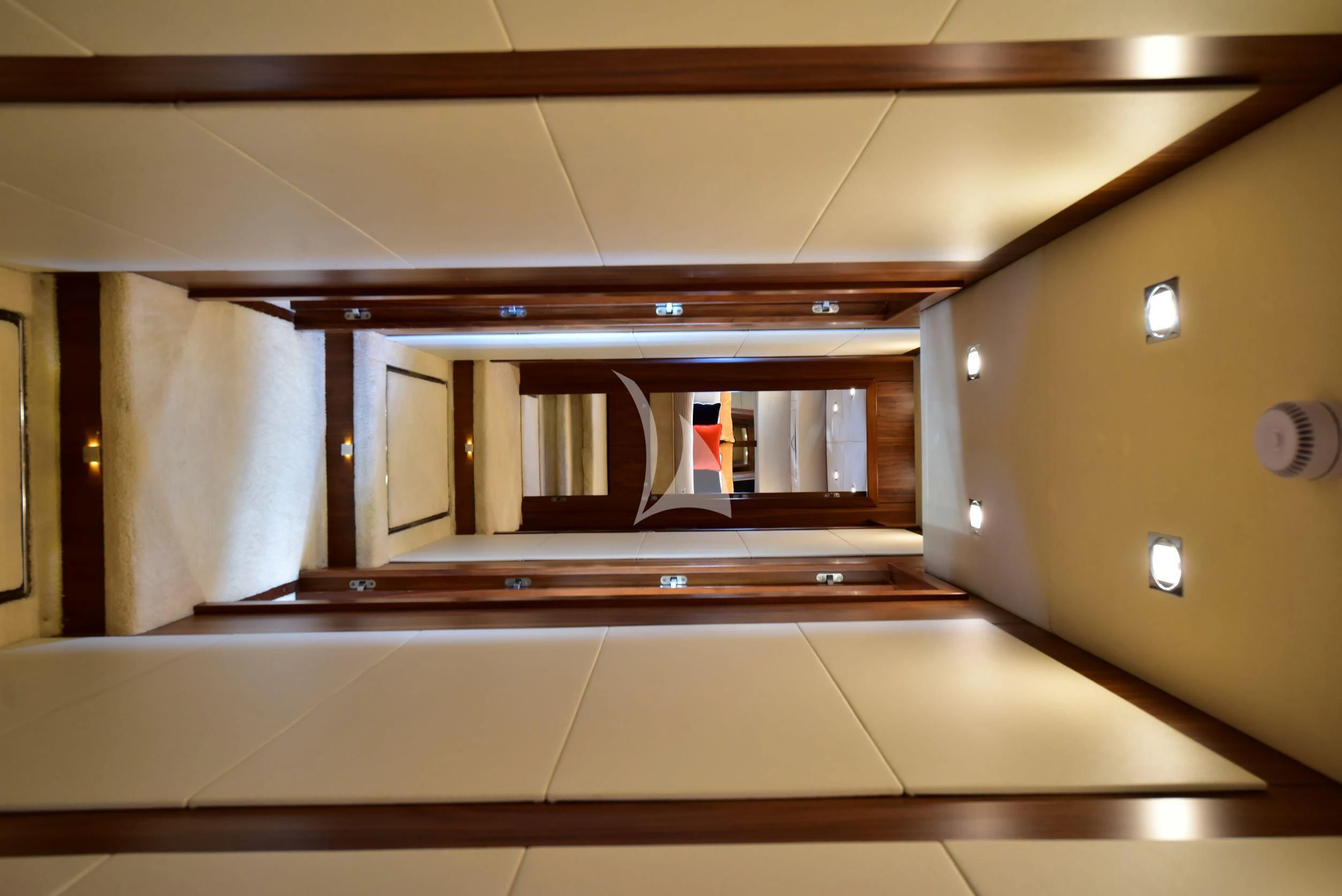 a view of a room with a mirror and a window aboard CATALANA Yacht for Charter