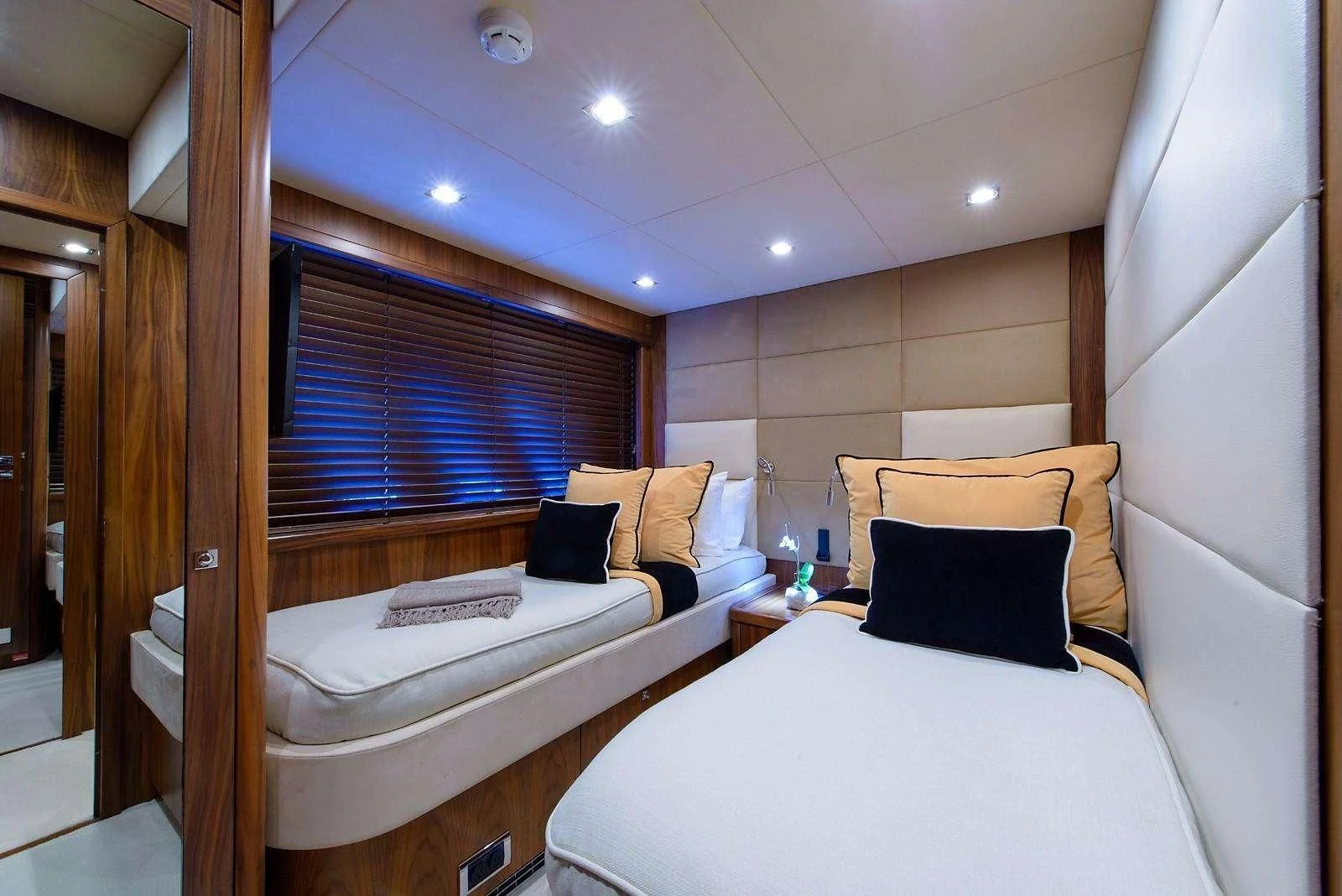 a room with two beds aboard CATALANA Yacht for Charter