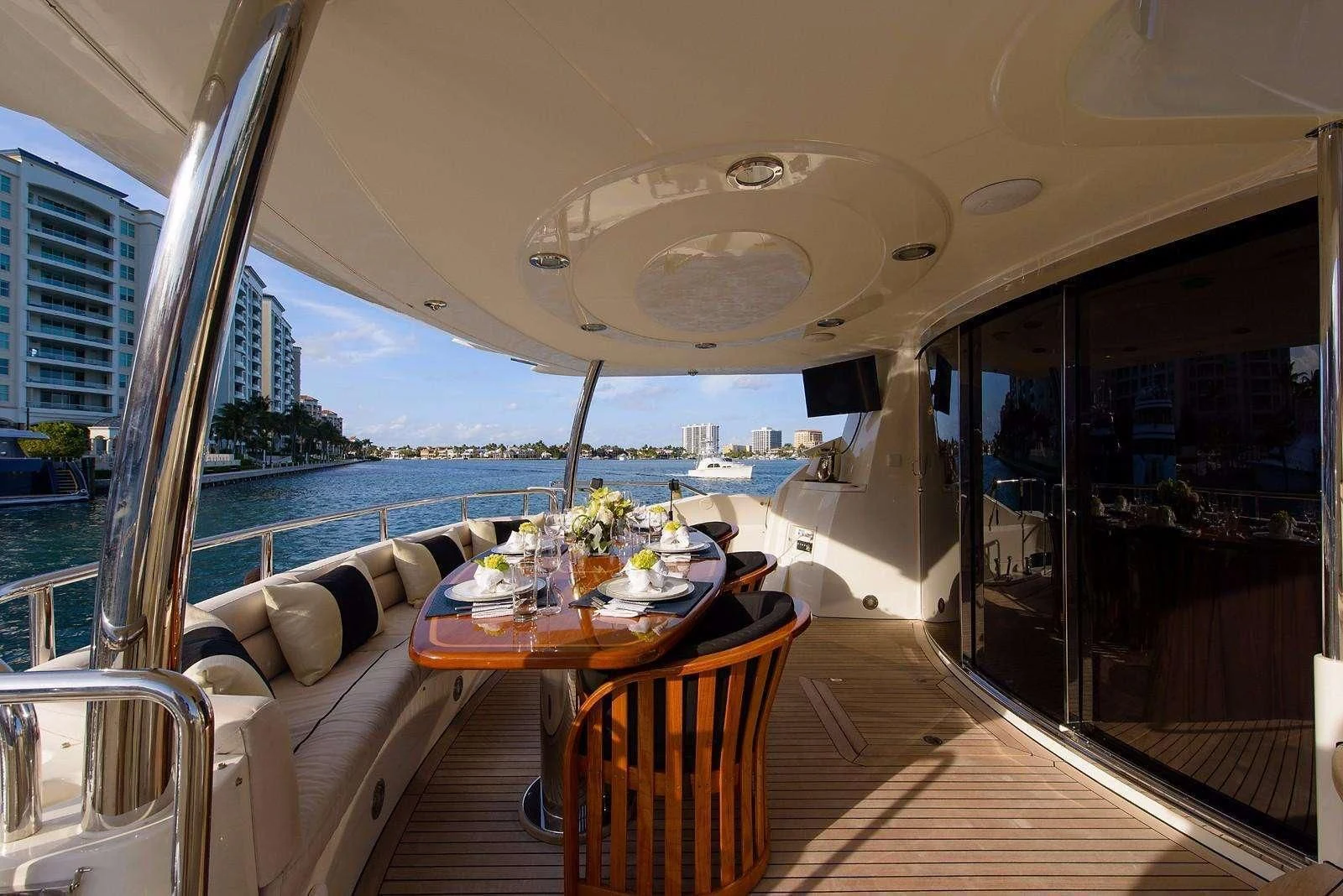 a table and chairs on a deck aboard CATALANA Yacht for Charter