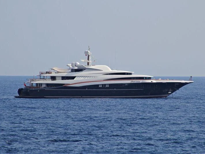 a large white boat in the water aboard WHEELS Yacht for Sale