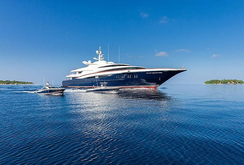 a large boat on the water aboard WHEELS Yacht for Sale