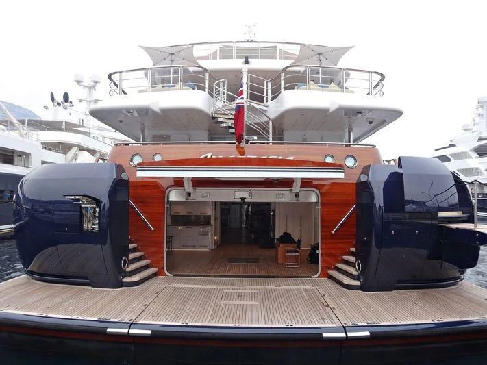 a large cruise ship docked aboard WHEELS Yacht for Sale
