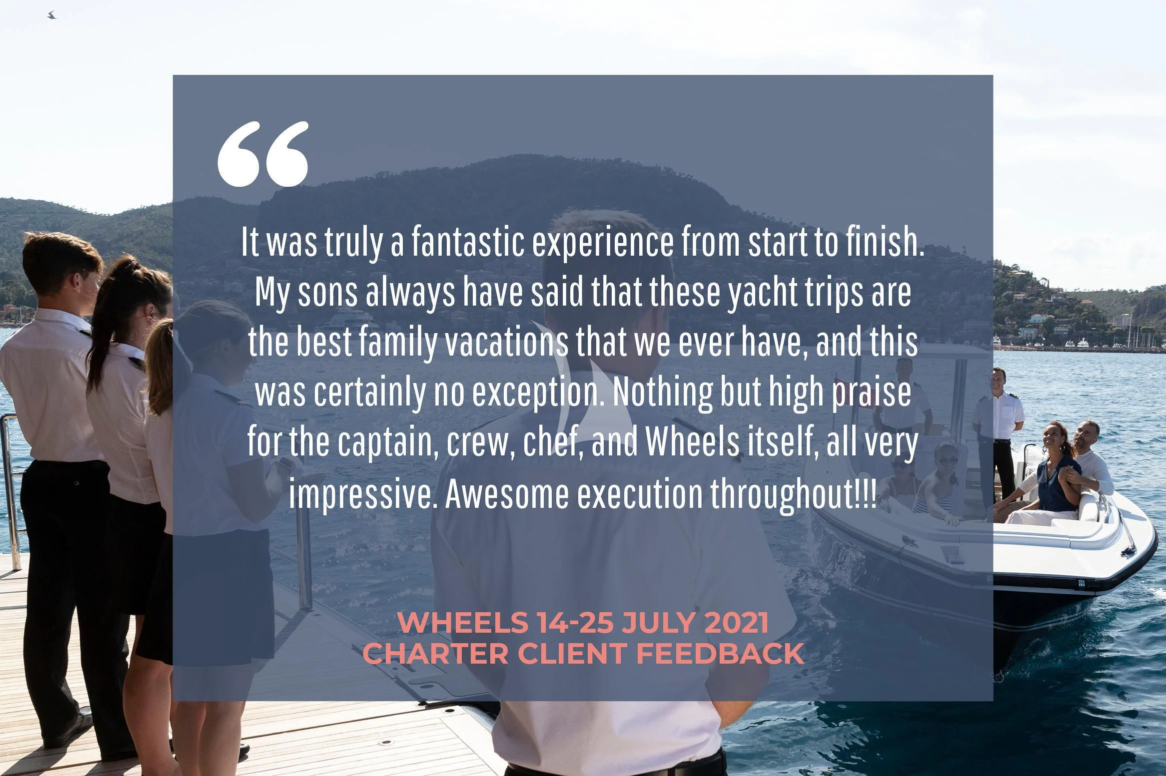 a group of people standing on a boat with a large blue sign aboard WHEELS Yacht for Sale